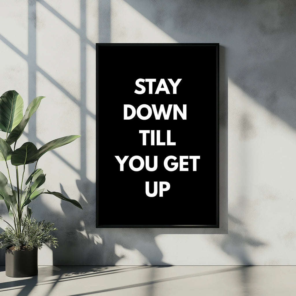 Motivational poster design with text Stay down till you get up in modern black frame on wall A1 Business-Hub
